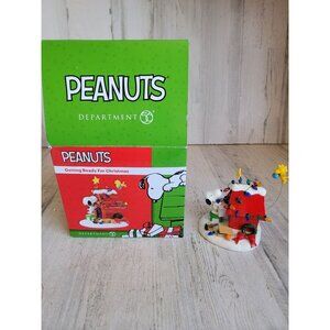 Dept 56 getting ready for Christmas snoopy village accessory
